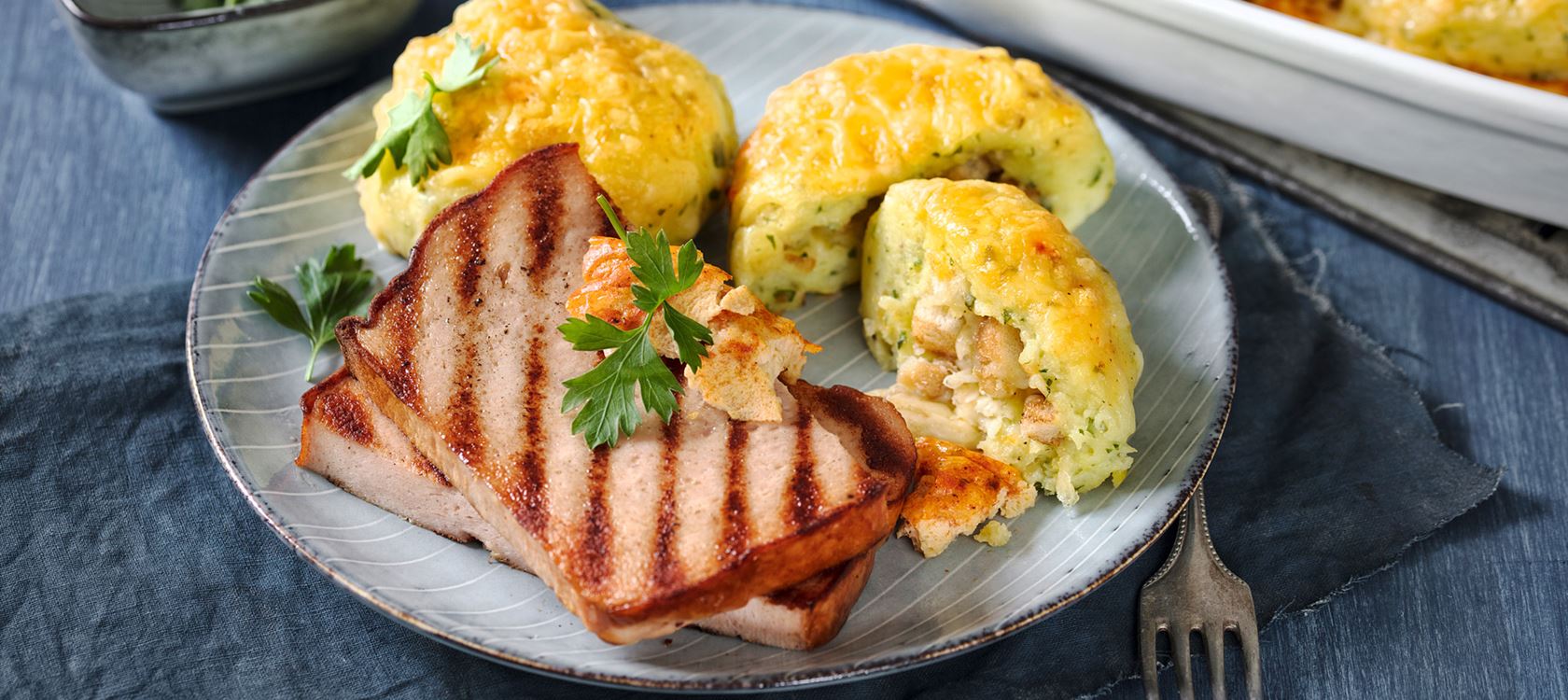 Überbackene Kartoffelknödel mit Leberkäse mit Finello® Ofenkäse