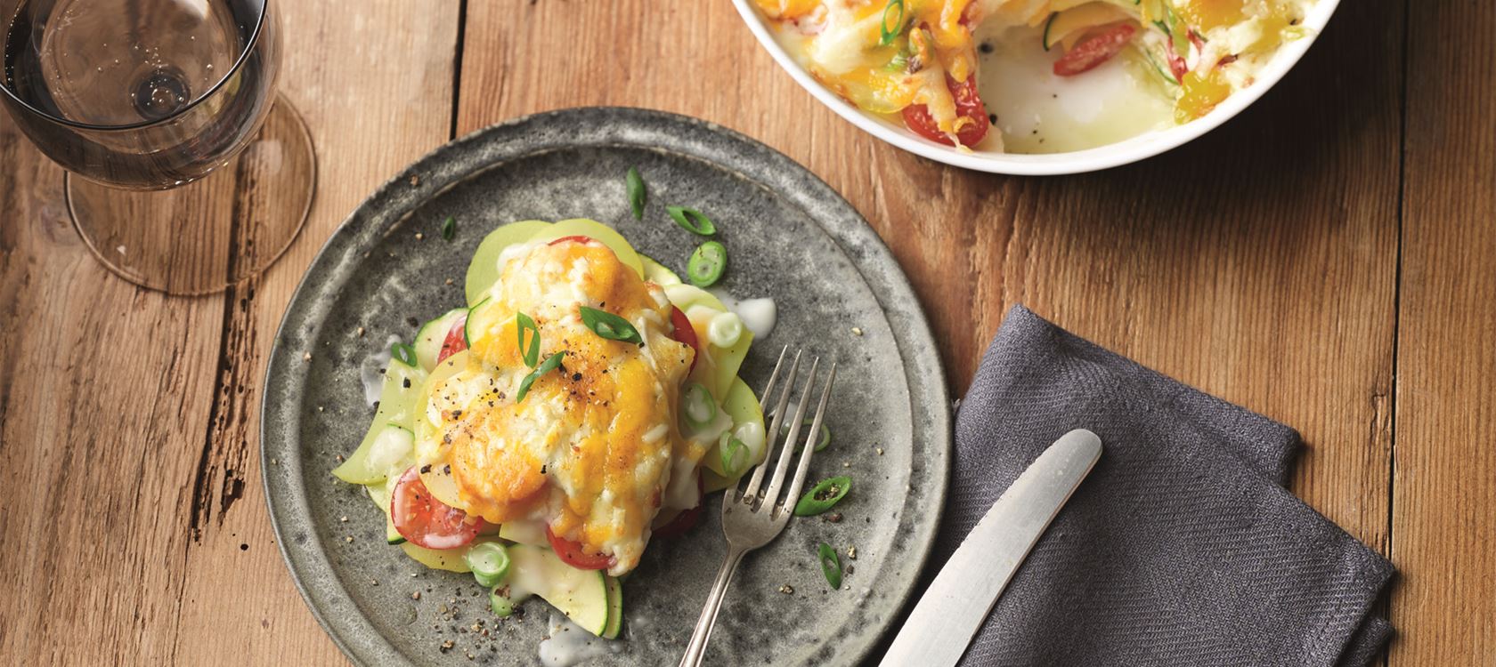 Kartoffelauflauf mit Zucchini und Kirschtomaten mit Finello® Ofenkäse