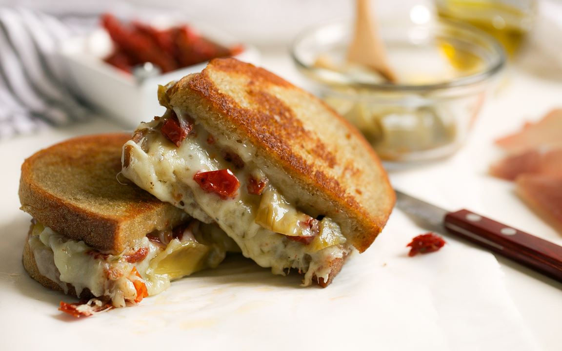Grilled Cheese with Sun Dried Tomatoes, Artichokes, and Prosciutto