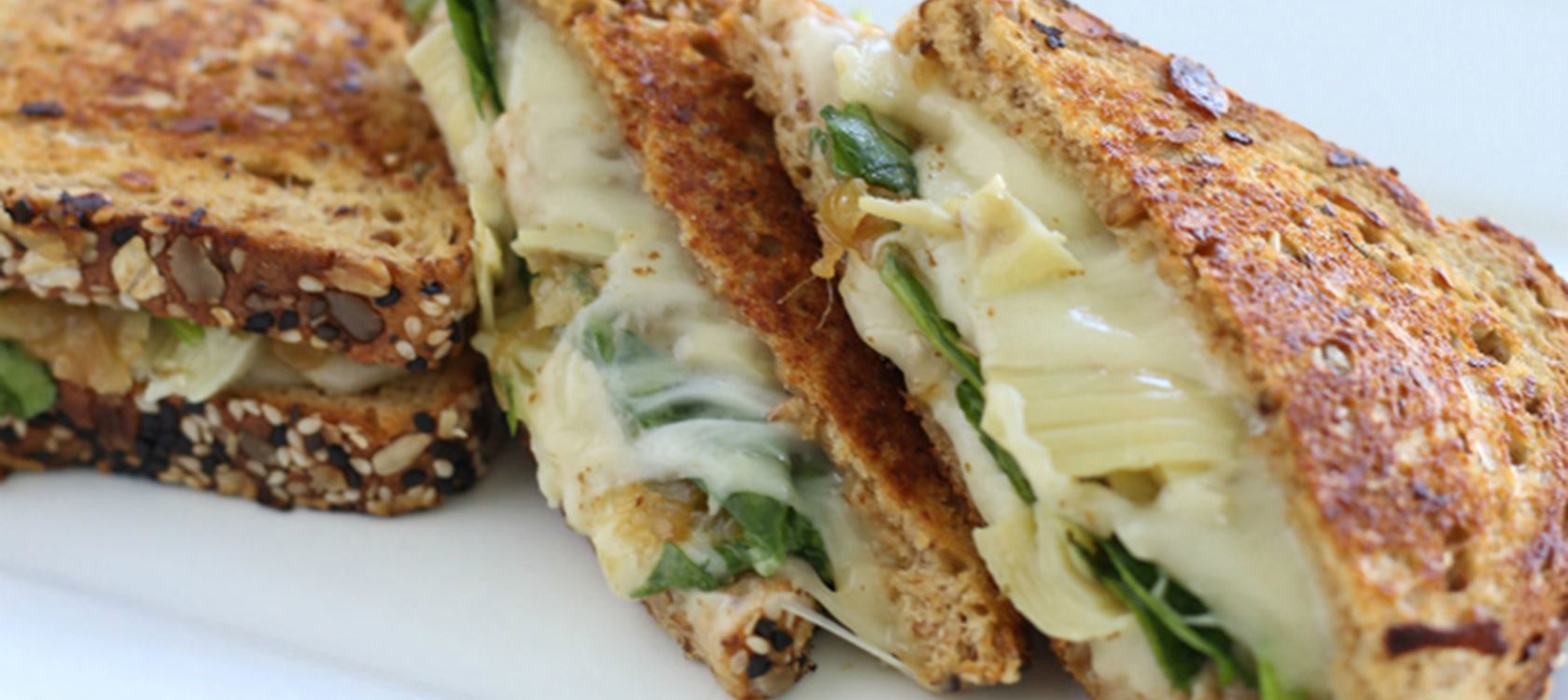 Grilled Cheese with Caramelized Onions, Spinach, and Artichokes
