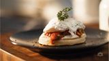 Moroccan Harcha with Poached Eggs, Spicy Tomato Sauce and Cream Cheese Spread