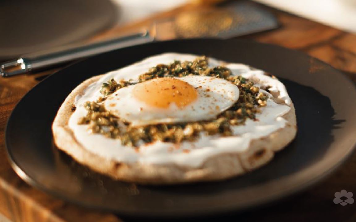 Fried Egg on Pita Bread with Green Olive Paste and Cream Cheese Spread