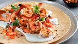 Tortilla wraps with cream cheese, grilled shrimps and salsa