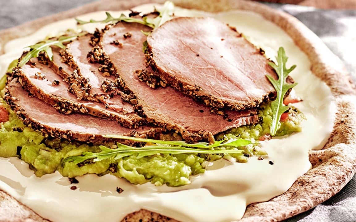 Arabic bread with cheese, guacamole, roast beef or pastrami and rocket salad