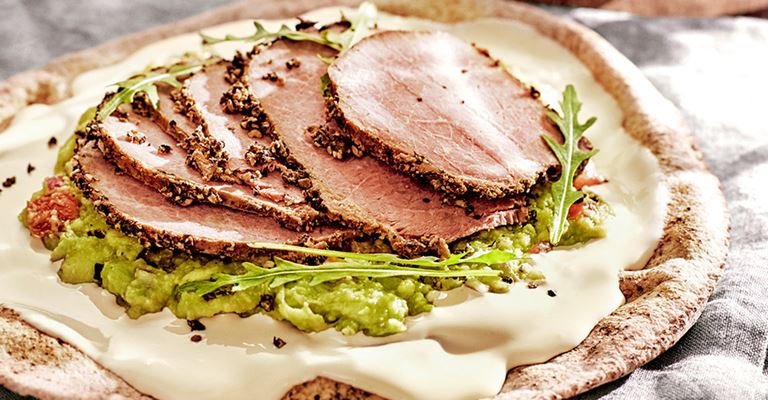 Arabic bread with cheese, guacamole, roast beef or pastrami and rocket salad