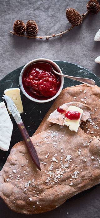 Giant crisp breads with plums and Double Cream Brie