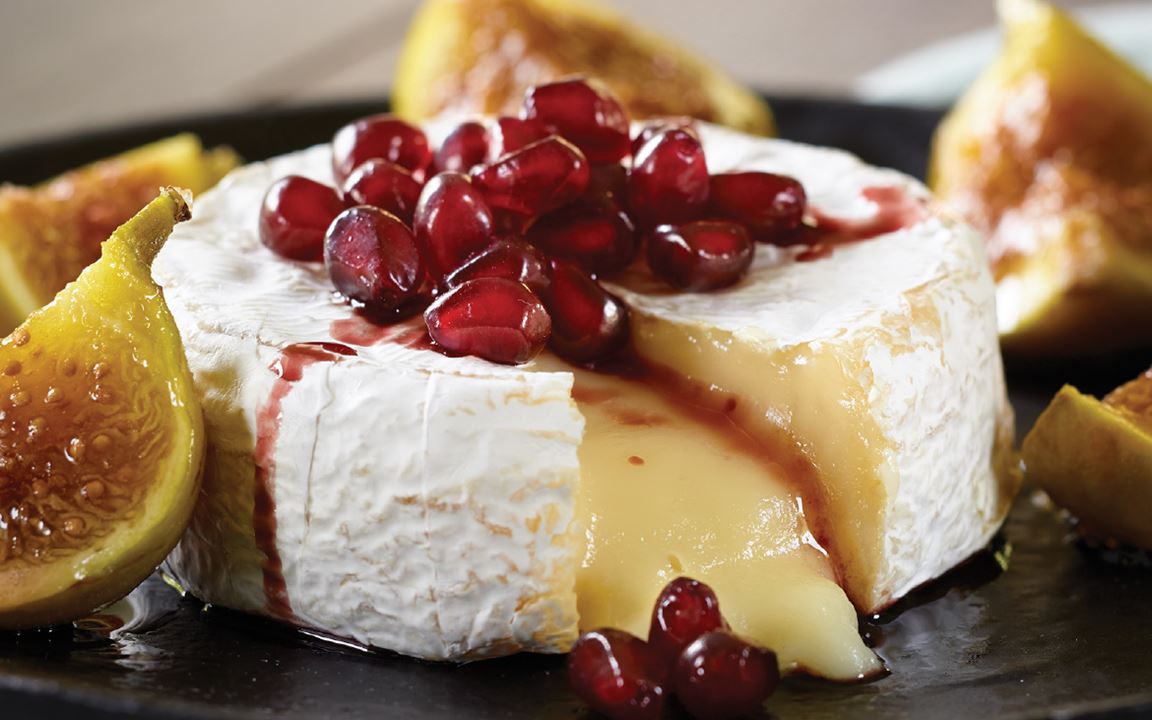 Baked Castello® Brie with Figs and Pomegranate Reduction