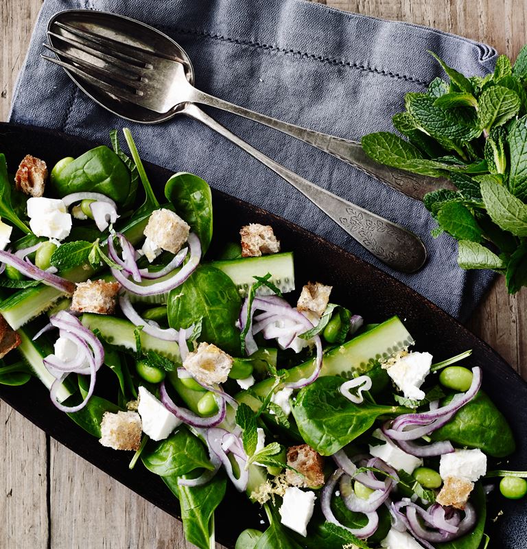 Greek-style cheese, spinach salad with mint 