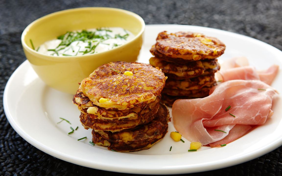 Sweetcorn pancakes with ham and chive dressing