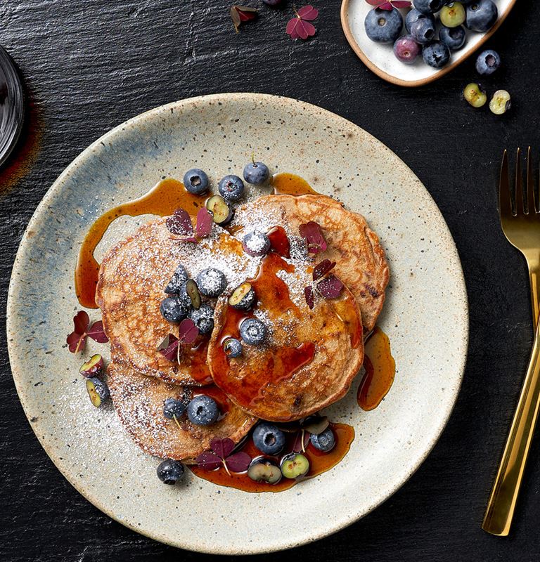 American pancakes with chocolate and blueberries