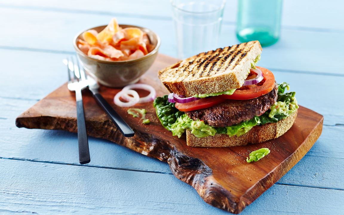 Beef sandwich with avocado cream and carrot salad