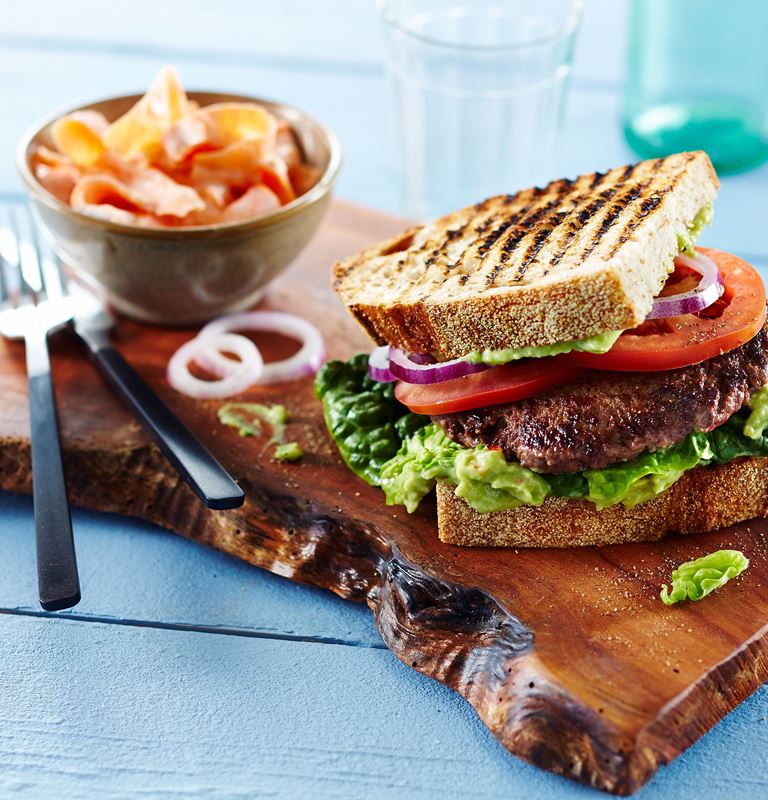 Beef sandwich with avocado cream and carrot salad