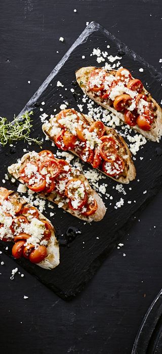Bruschetta with semidried tomatoes &  grated Cheddar