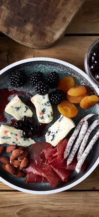 Creamy Blue Cheese with nuts, bresaola, sausages, fruits and berries