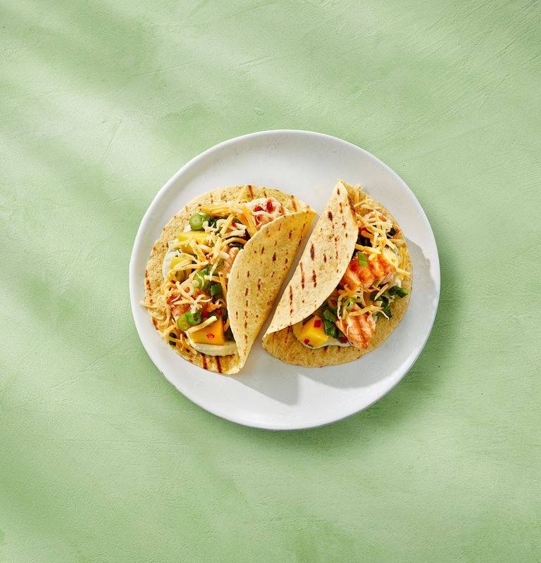 Fish tacos with salmon, mango salsa, and Castello® Tex-Mex Cheese