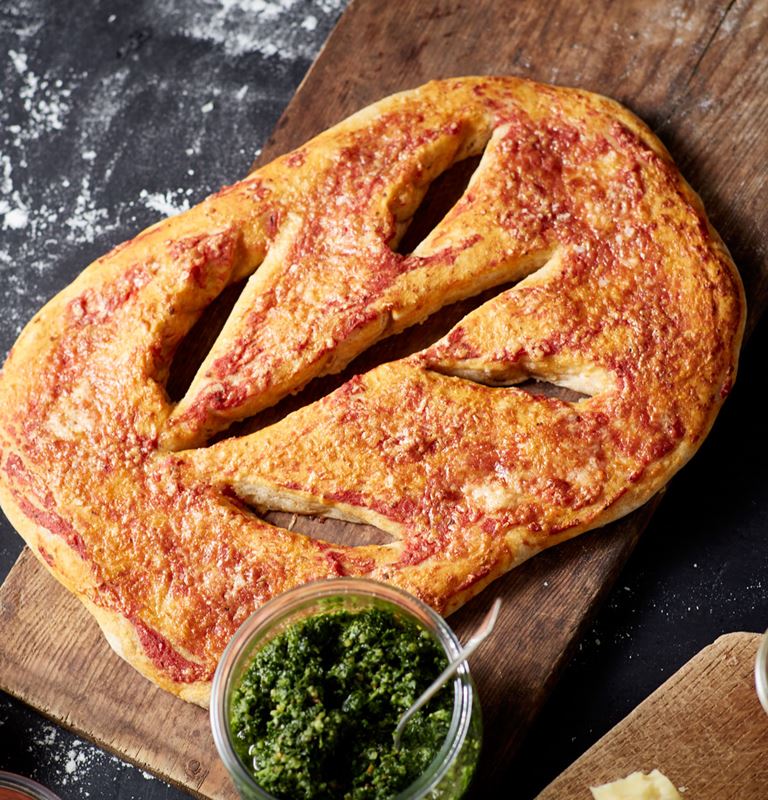 Fougasse with Extra Mature Cheddar, tomatoes and curly kale pesto – the ultimate recipe