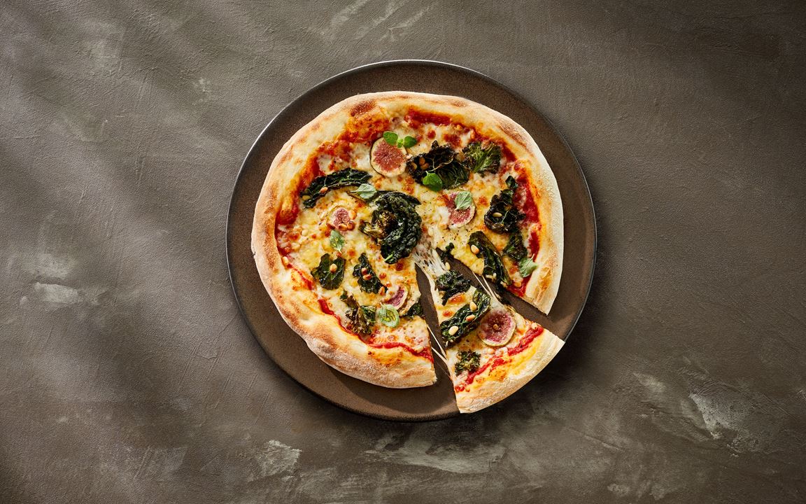 Kale and fig pizza with Castello® cubed mozzarella
