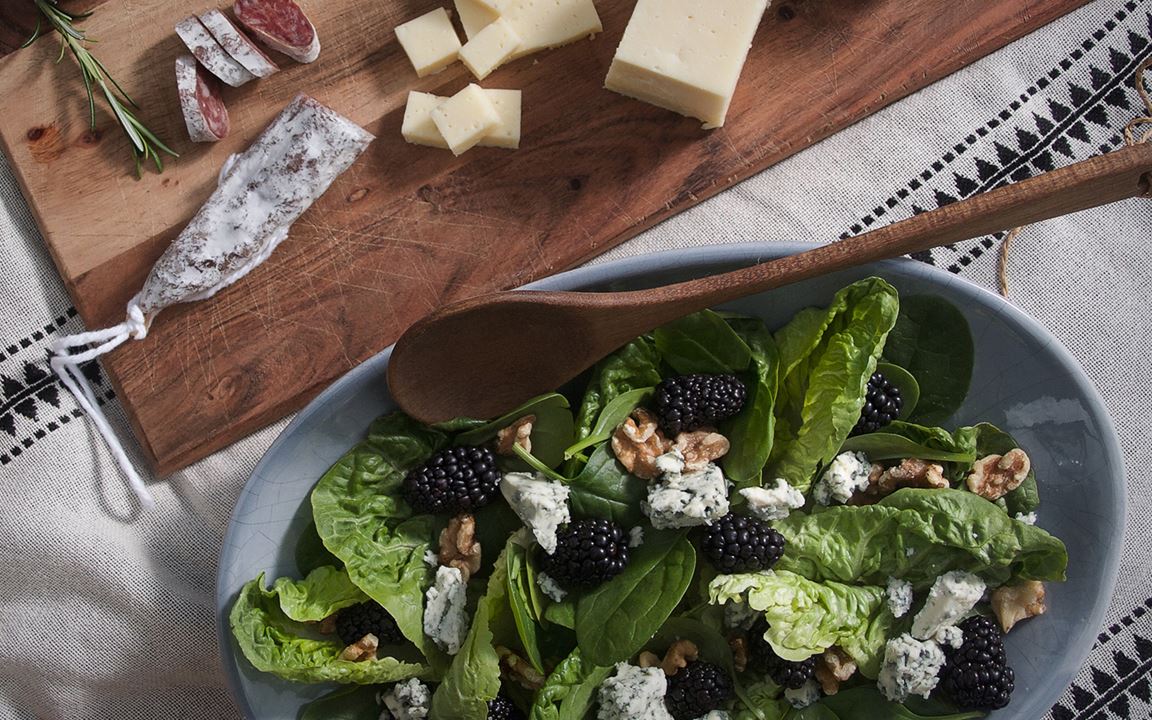 Castello® Blue cheese salad with spinach, walnuts, and blackberries