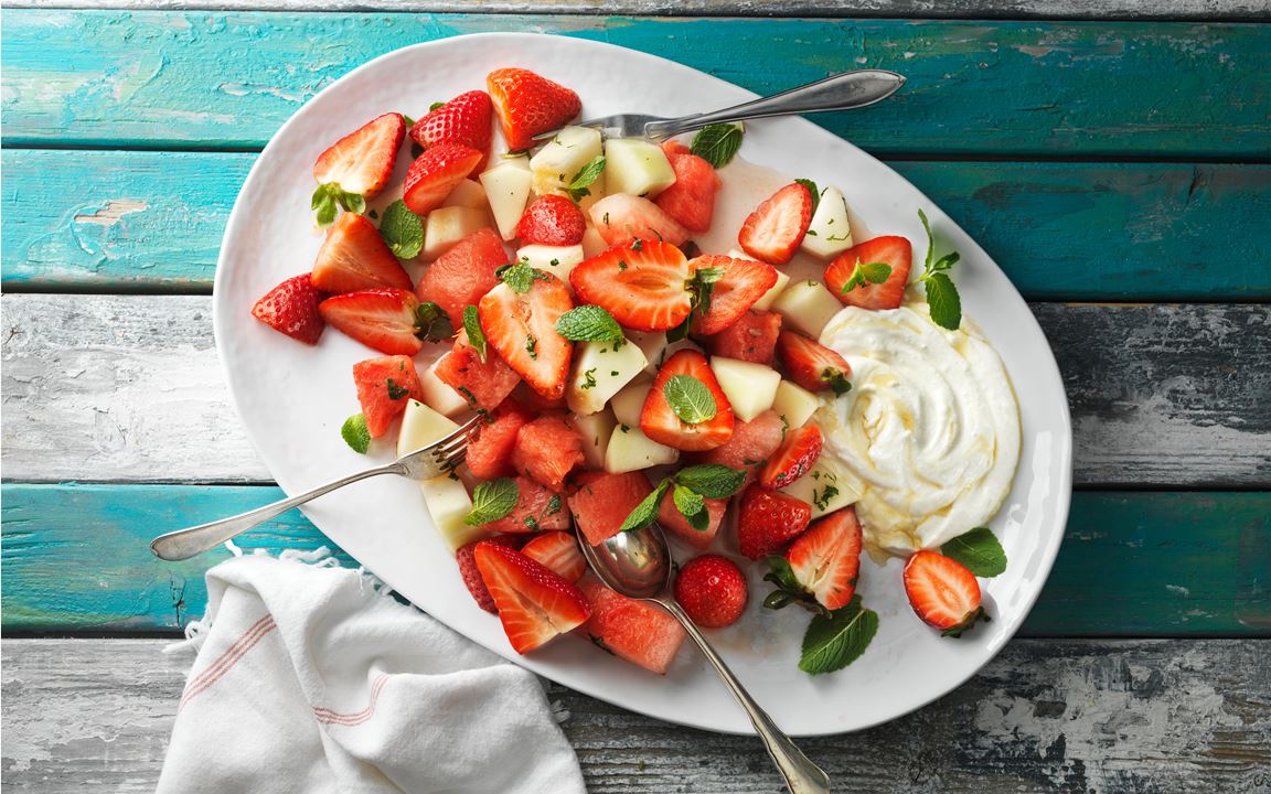 Strawberry salad with melon, lemon and mint