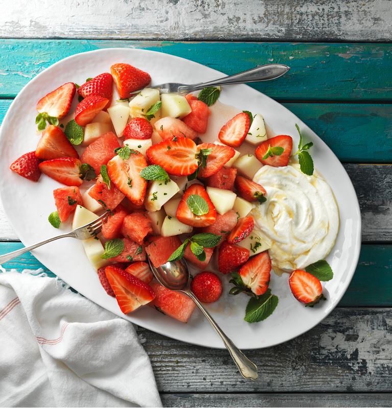 Strawberry salad with melon, lemon and mint