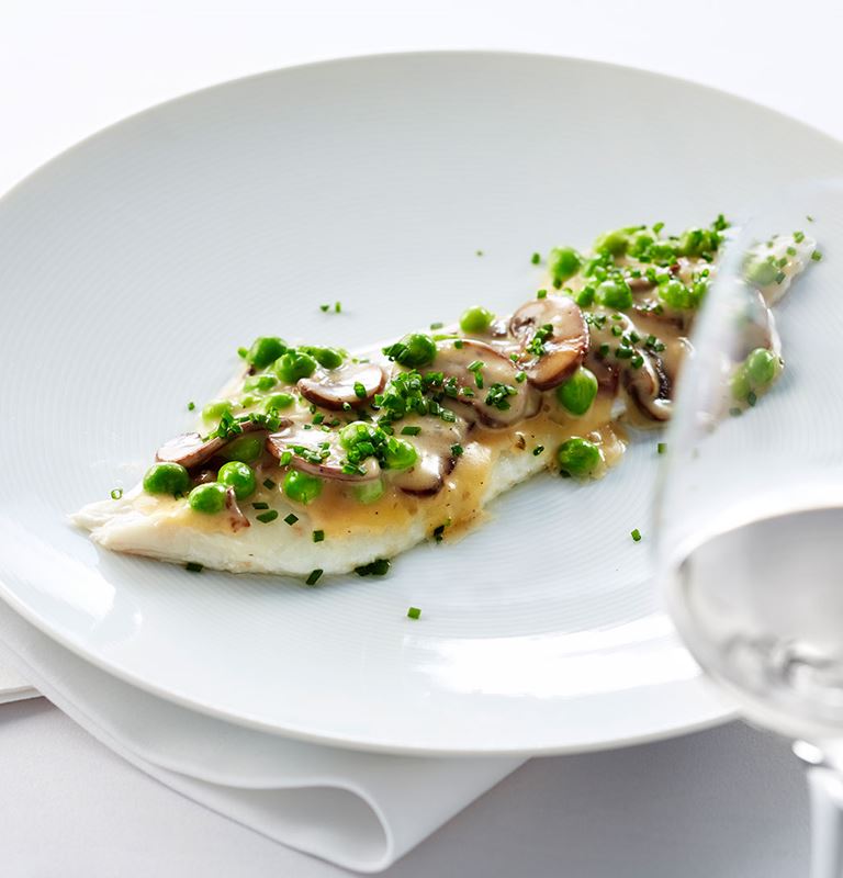 Baked sole with mushrooms & peas