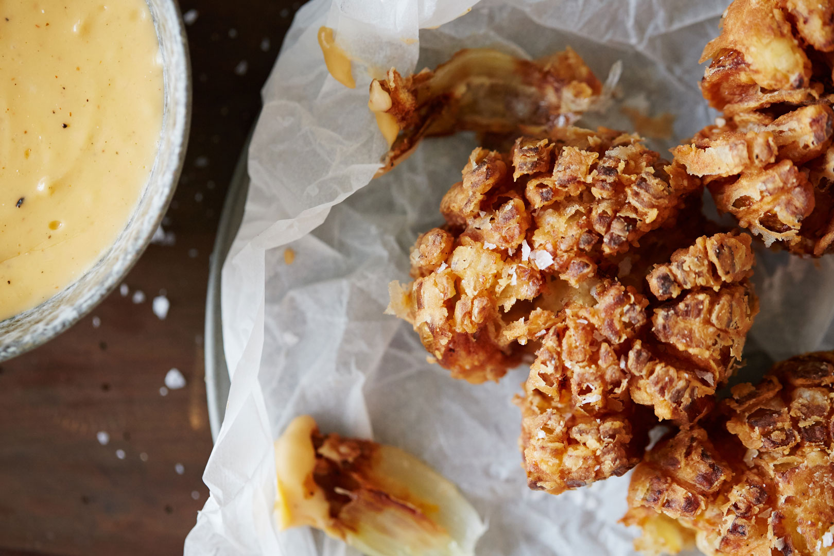 Blooming Onion With Chipotle Cheese Dip Castello
