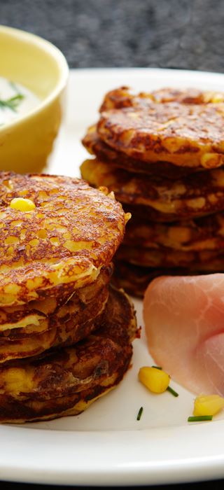 Sweetcorn pancakes with ham and chive dressing