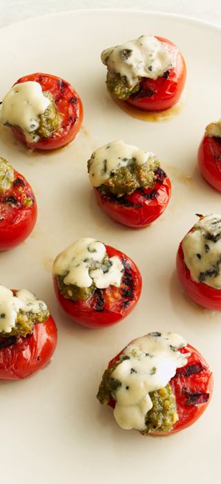 Grilled tomatoes with Blue Cheese slices and basil pesto
