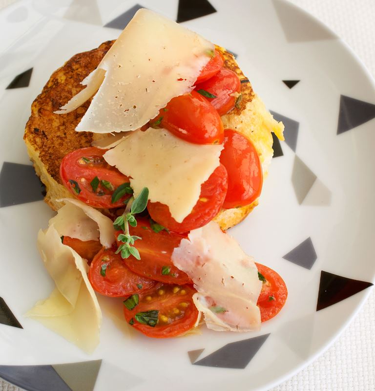 Savory brioche french toast with Aged Havarti, sautéed cherry tomatoes and oregano
