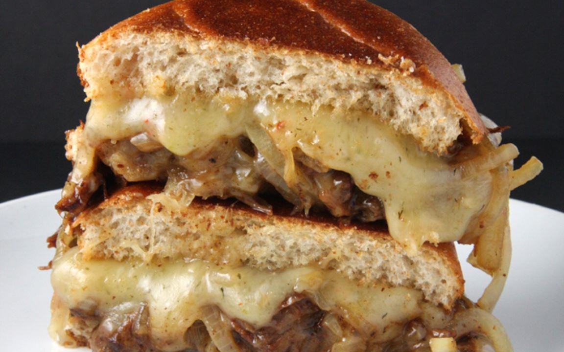 Slow cooked lamb burgers with Havarti and caramelized onions