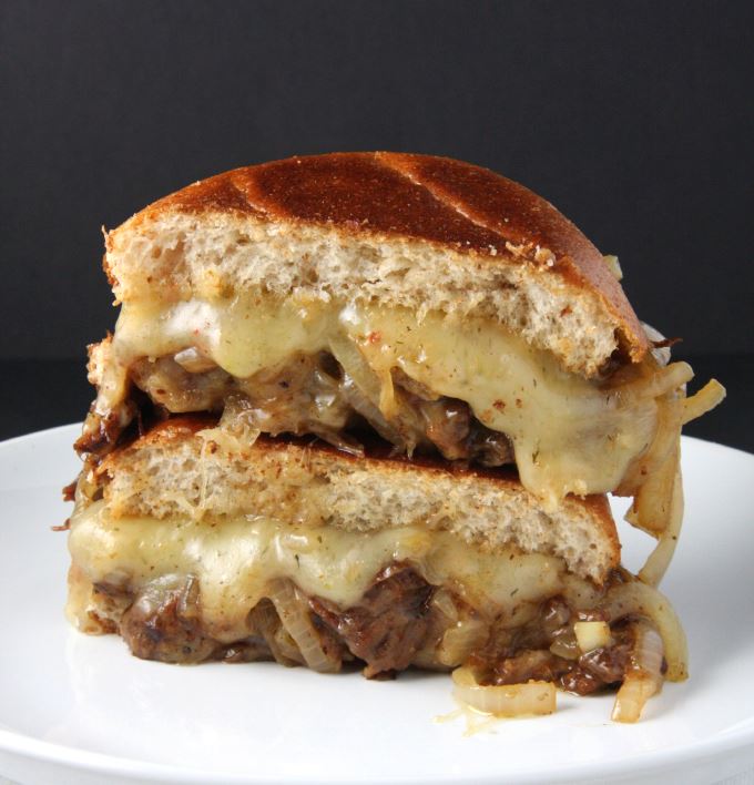 Slow cooked lamb burgers with Havarti and caramelized onions
