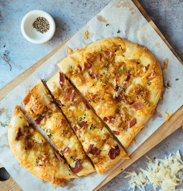Smoked Fontina Pizza with Caramelized Onions and Bacon