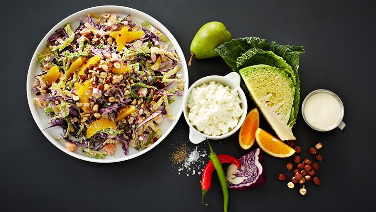 Crisp cabbage salad with chilli, cottage cheese and orange