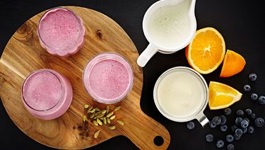 Orange and buttermilk smoothie with blueberries