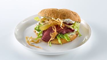 Potato, onion and roast beef sandwich