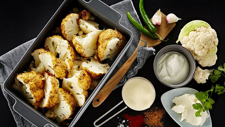 Whole-baked cauliflower with hot spices