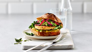 Sourdough burger with mango and crunchy kale