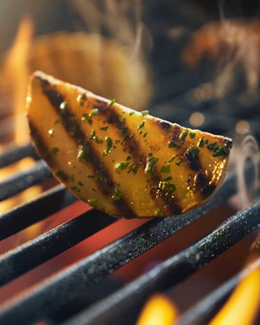 Grilled buttery herb potatoes 