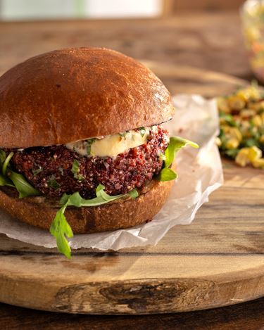 BEETROOT, QUINOA AND BLACK BEAN BURGER WITH CHIPOTLE BUTTER AND SWEET CORN SALSA 